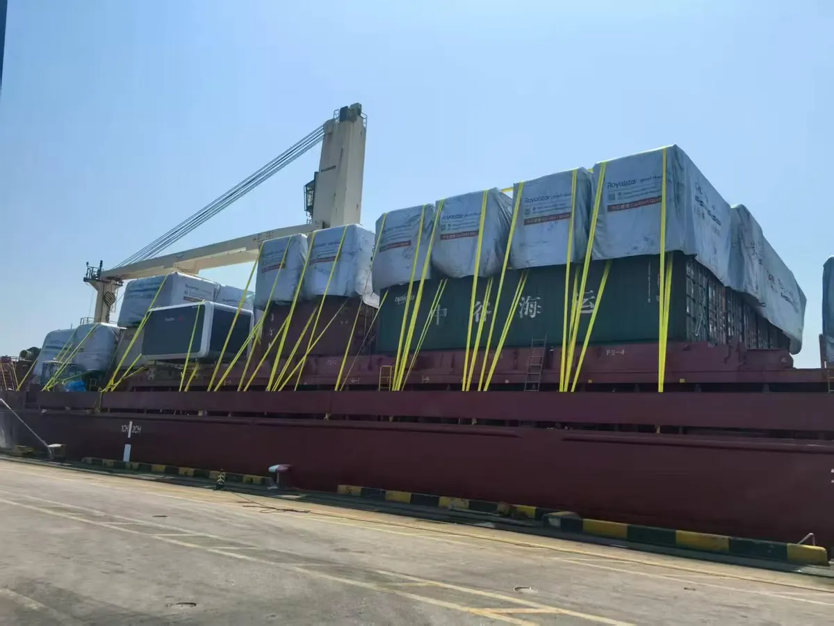 A cargo ship loaded with wrapped capsule houses